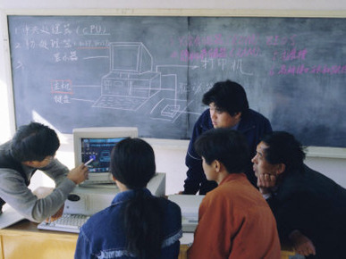 Students at a Computer Demonstration in a Class at a Rural School, China