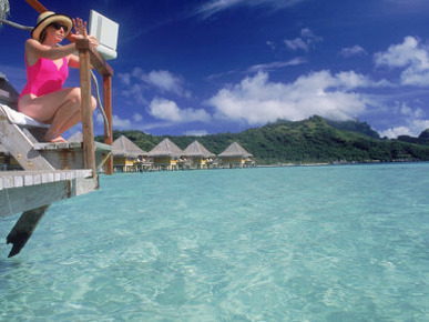 Woman with Laptop Computer in Bora Bora