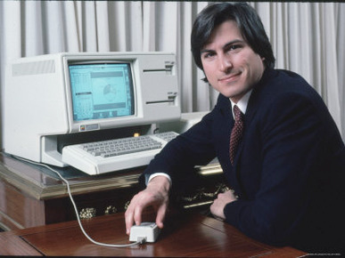 Apple Computer Chairman Steve Jobs with New Lisa Computer During Press Preview