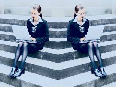Two Women Working on Laptop Computers