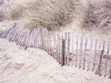 Computer Altered Image of a Fence by Sand Dunes