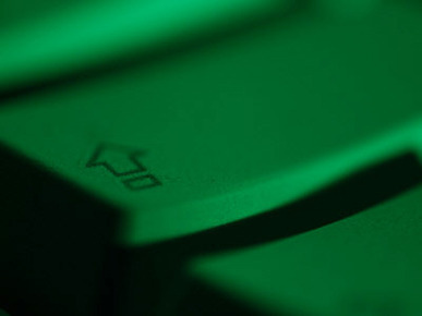 Green Tinted Return Button on a Computer Keyboard