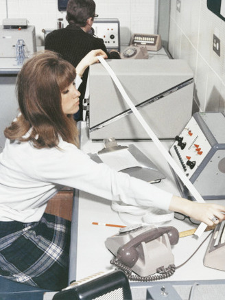 A Computer Technician with Data Tape