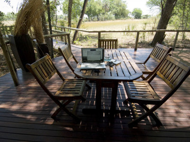 A Laptop Computer on a Table in Okavango's Chitabe Camp