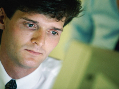 Man Looking at Computer Screen